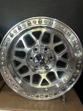 (4) 17X9 KMC KM549 SILVER MACHINED OFF-ROAD RIM(6X139.7 +0MM) SILVERADO TACOMA