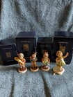 Lot of 4 Hummel Goebel Porcelain Figurines made in Germany - Boxes included