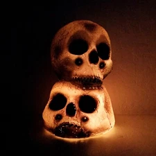 VTG Paper Magic Group Blow Mold Double Skulls Halloween Blinking Light 1999