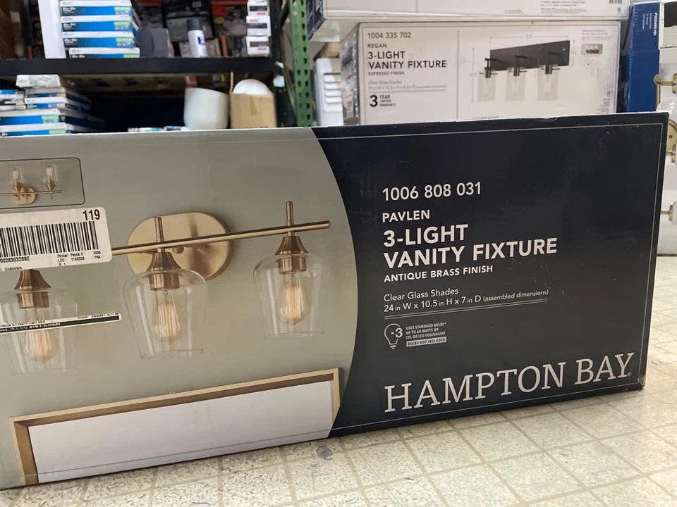 Pavlen 24 in. Luz de tocador antigua de latón de 3 luces con pantallas de vidrio transparente Foto 2 de 4