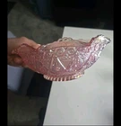 Pink carnival glass bowl highly collectible due to the quality and uniqueness
