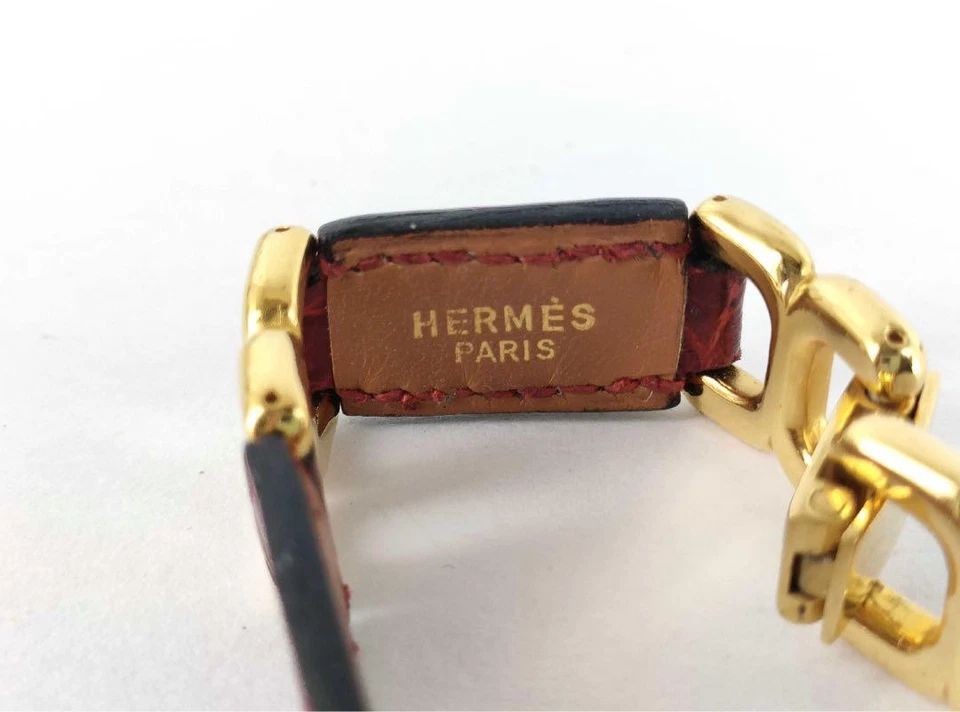 Pulsera Hermes de cuero rojo con cadena dorada usada Foto 4 de 4
