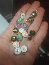 16 skittles charms  gold  / colored   lot of 16 zipper pulls