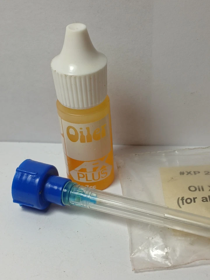 1 pieza 1981 Aurora HO Slot Car AFX PLUS aceite especial de carreras con micro aguja Foto 3 de 4