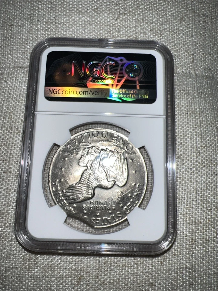 1974 D $1 Brilliant Uncirculated Mint Error Curved Clipped  - Image 2 of 2