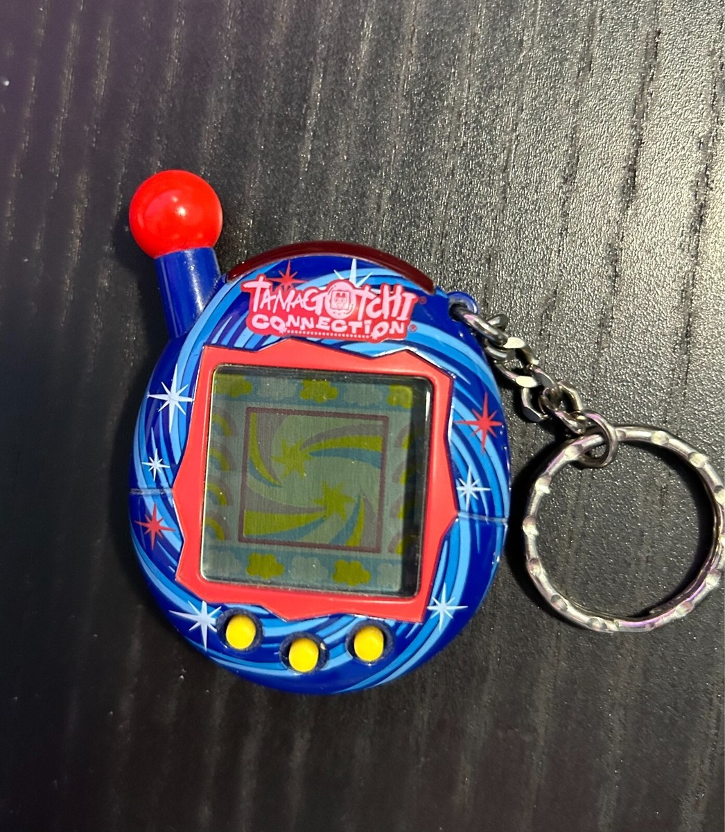 【玩具】 Tamagotchi Connection 2004年製 海外版 レア Tamagotchi Connection V4 2004 Red & Blue Galaxy Swirl Stars