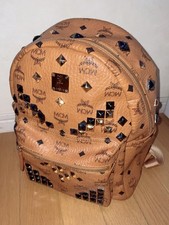 MCM Studded Logo Leather Backpack Brown Gold Black Zip Top Handle for Men