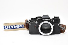 Near Mint- Olympus OM10 35mm SLR Film Camera Black Body Only 89875