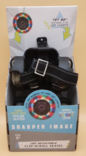 Sharper Image Adjustable Clip-N-Roll Skates Colored LED Lighted Wheels NIB