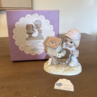2012 Precious Moments Using My Gifts Brings Happiness Porcelain Figurine
