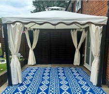 Sorrento Luxury Gazebo with net curtains and thick cream curtains, 3x3.3 m. 