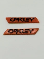 OAKLEY SUTRO, SUTRO LITE & SWEEP SUNGLASSES ORANGE SIDE LOGO ICONS TEMPLE ICON