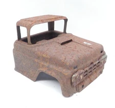 Rusty Metal that used to be a 1960's Buddy L Truck Cab Pressed Steel