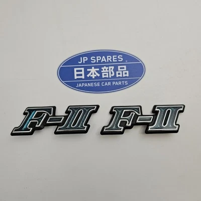 NOS Nissan Datsun Cherry F2 F10 Emblem 78803-M4800 Genuine 482 - Bild 1 von 4