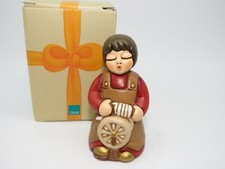 THUN, Presepe classico. " Donna con arcolaio", rosso. Fuori produzione.