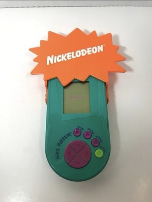 Nickelodeon Nick Puzzler Teal/blue Handheld Travel Game Electronic LCD Works
