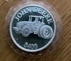 1 oz solid .999 silver John Deere 8400 round. Sealed from the mint. Rare