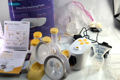 Medela Pump In Style & Medela Harmony, New bottles, tubes, Pads, book, Extras