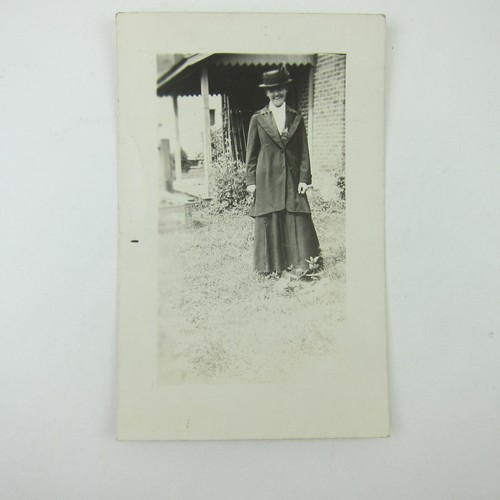 RPPC Photo Postcard Woman in Suit Dress & Hat Stands Outside House Antique 1910s