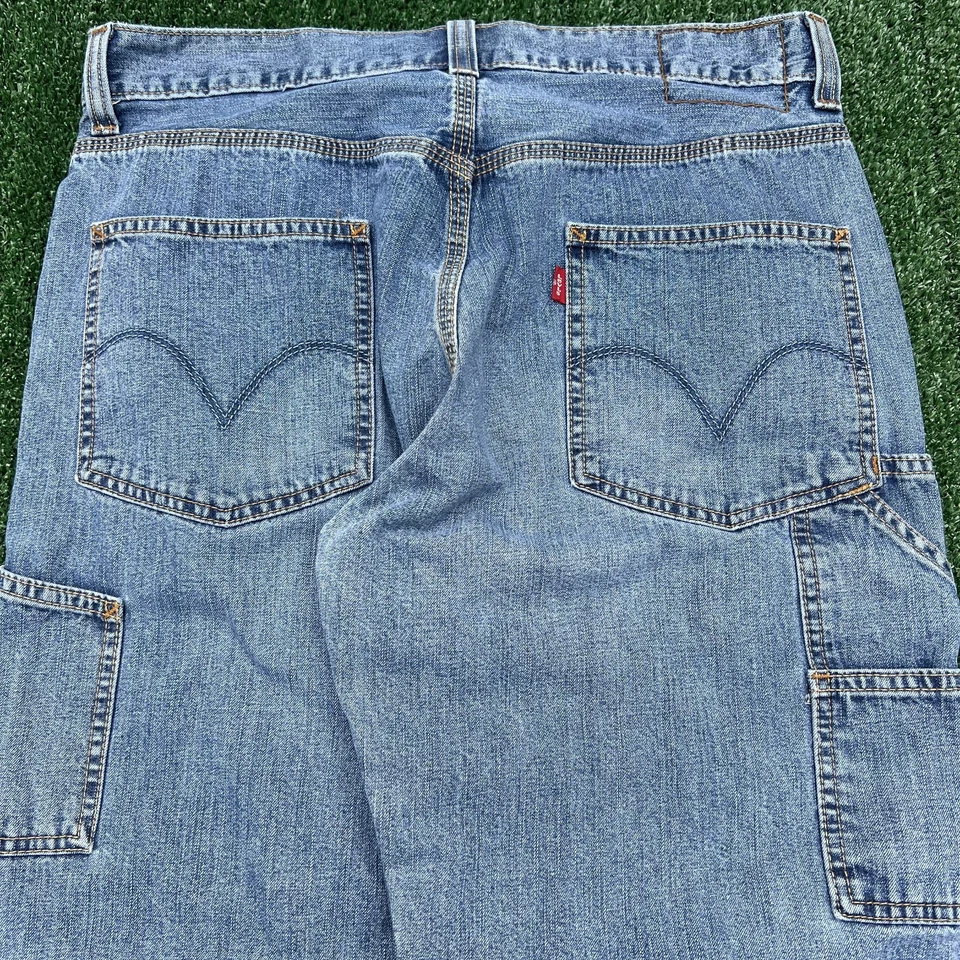Pantalones de mezclilla vintage Levi's Carpenter para hombre 34x29" azules holgados pierna ancha sueltos lengüeta roja Y2K Foto 2 de 4