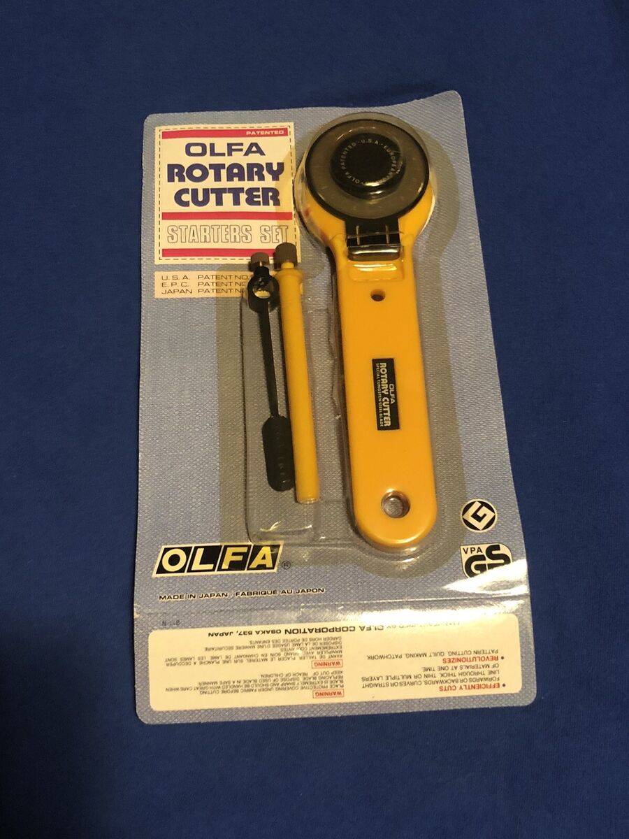 Vintage New Old Stock OLFA Rotary Fabric Cutter Semi Sealed Made in Japan.  Read