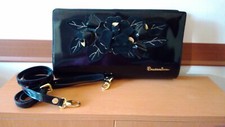 Braccialini pochette nera e oro con tracolla