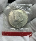 1969 D KENNEDY HALF 40 % SILVER  UNCIRCULATED STILL IN MINT CELLO P161