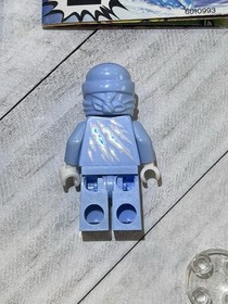 LEGO Ninjago: NRG Zane (9590)Minifigure w/ some weapons and spinner