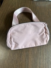 Light Pink Fanny Bag. Zip Closure. Pockets. Adjustable. 5  x9  .
