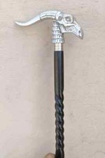 Elegant walking stick, twisted cane, wood and metal, black and silver Designer