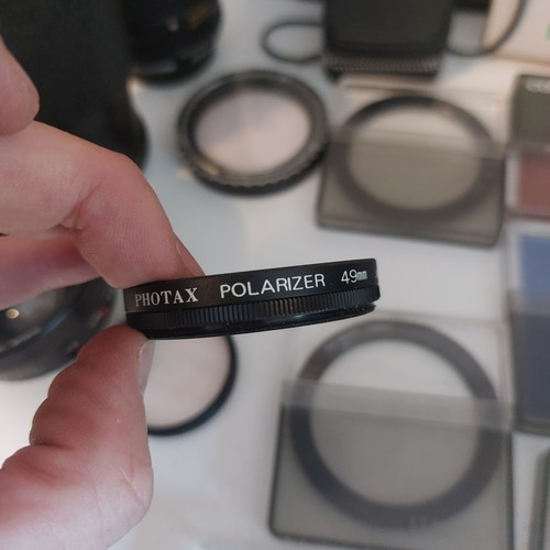 Paquete de lentes de cámara X3 lentes, filtros, Bell Howell, Panagor, lentes solares. - Imagen 8 de 17