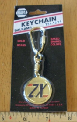 ZX Kawasaki Nissan keychain solid brass early 1980s NOS baked