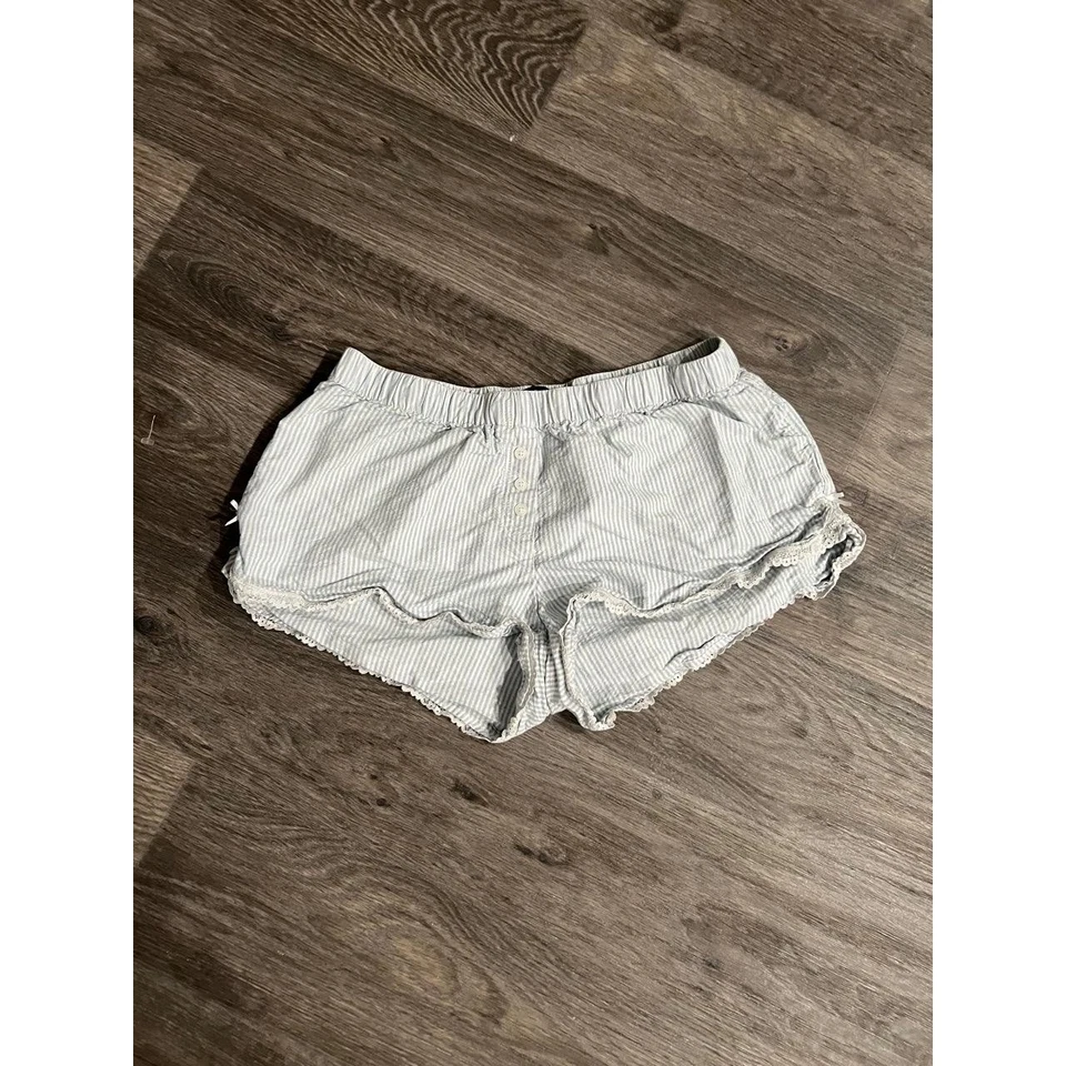 Pantalones cortos Brandy Melville para mujer talla única XS/S azul claro a rayas salón ribete de encaje Foto 2 de 4