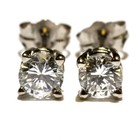 GIA certified 14k white gold .68ct round diamond 4 prong solitaire stud earrings — photo 1