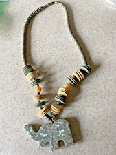 VINTAGE INLAID GREEN ELEPHANT WITH GREEN AND WOOD TONE BEADED NECKLACE