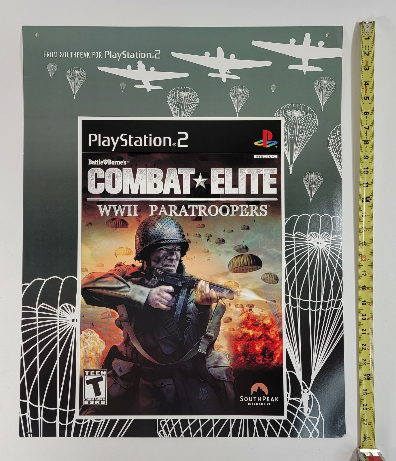 Letrero de exhibición de tienda de videojuegos COMBAT ELITE WWII paracaidistas SONY PS2 promoción 
