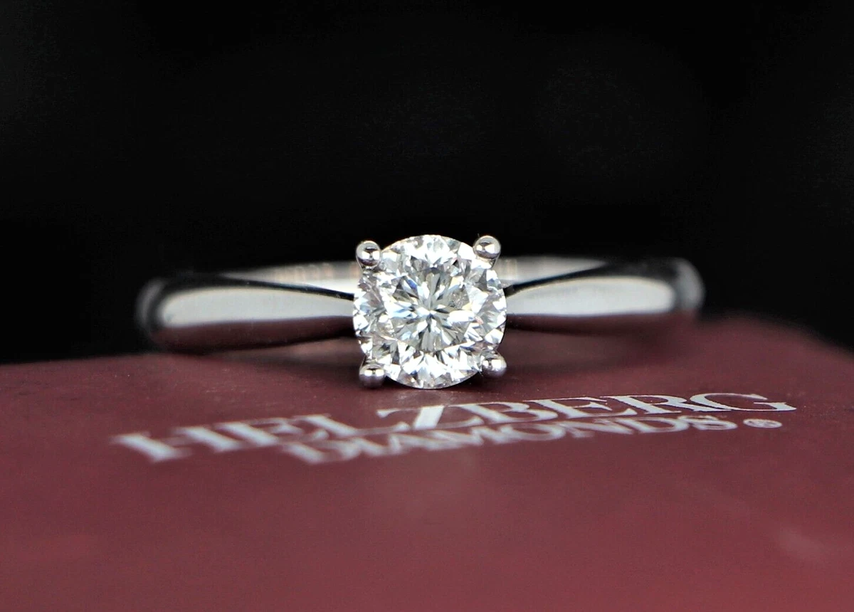 Helzberg Radiant Star 14k White Gold .81ct Natural Round Diamond
