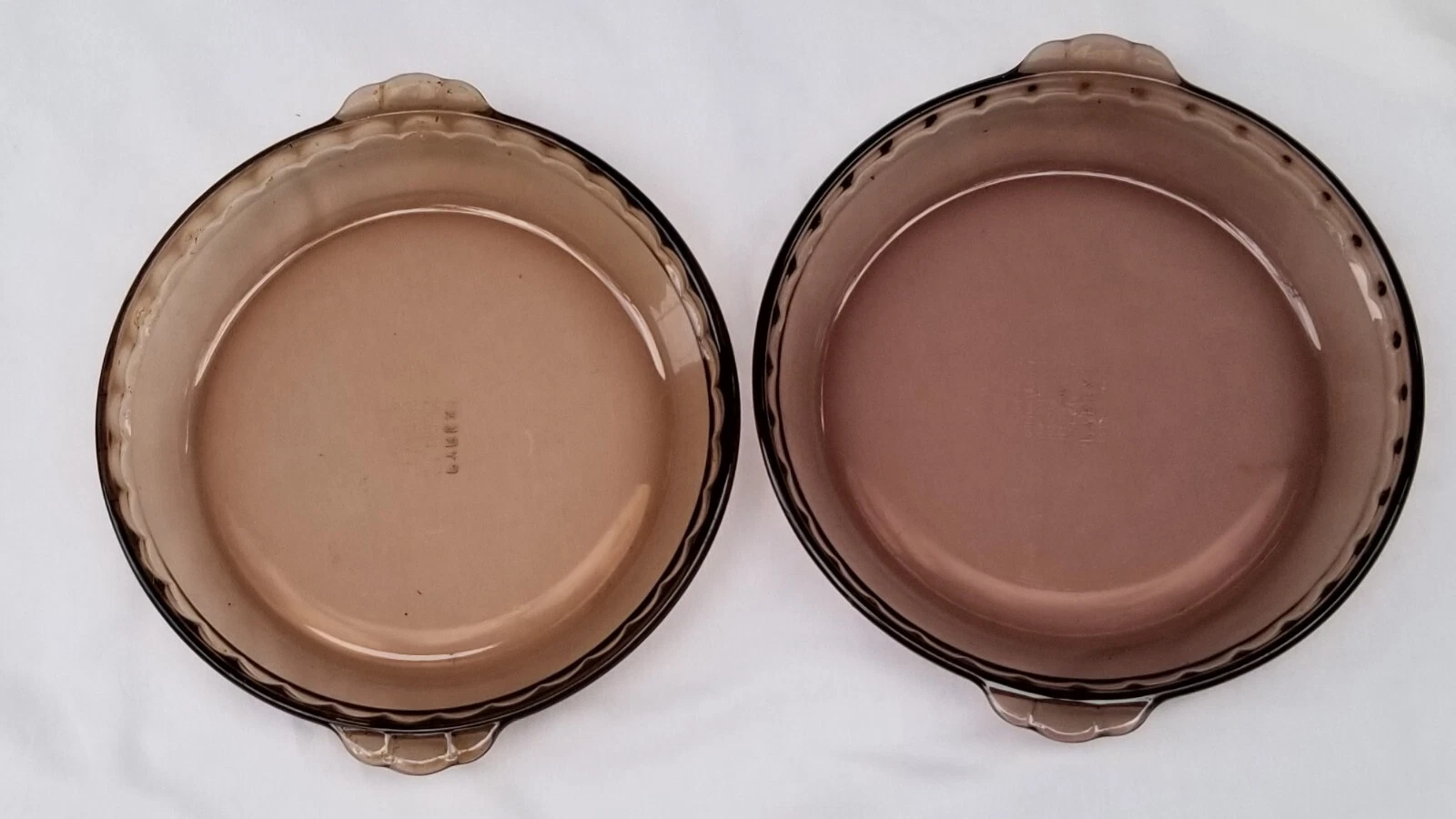 SET OF 2 FIRESIDE by PYREX AMBER GLASS 9" PIE PLATES (marked 229) FLUTED RIMS