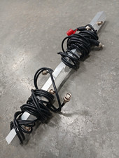 Coaxial breakout harness mounted to an aluminum L-angle bracket.