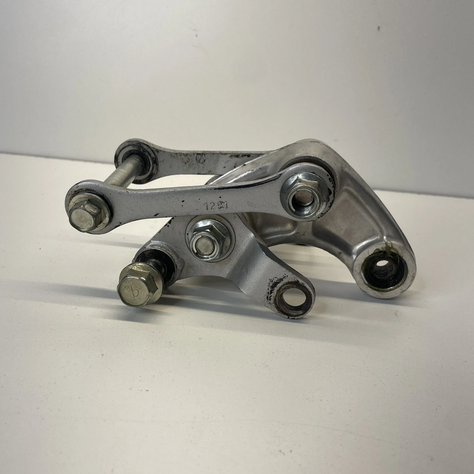 01-13 KAWASAKI KX 100 KX 85 OEM REAR SHOCK LINKAGE SWINGARM LINKS