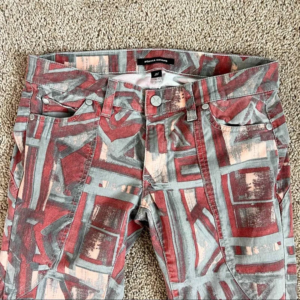 Pantalones ajustados Monika Chiang Moto para mujer 25 rojo gris geométrico tiro bajo cremallera al tobillo Foto 2 de 4