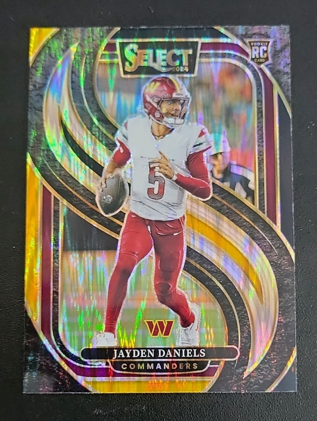 2024 Panini Select Premier Level Jayden Daniels #112 Black & Gold Shock Prizm RC