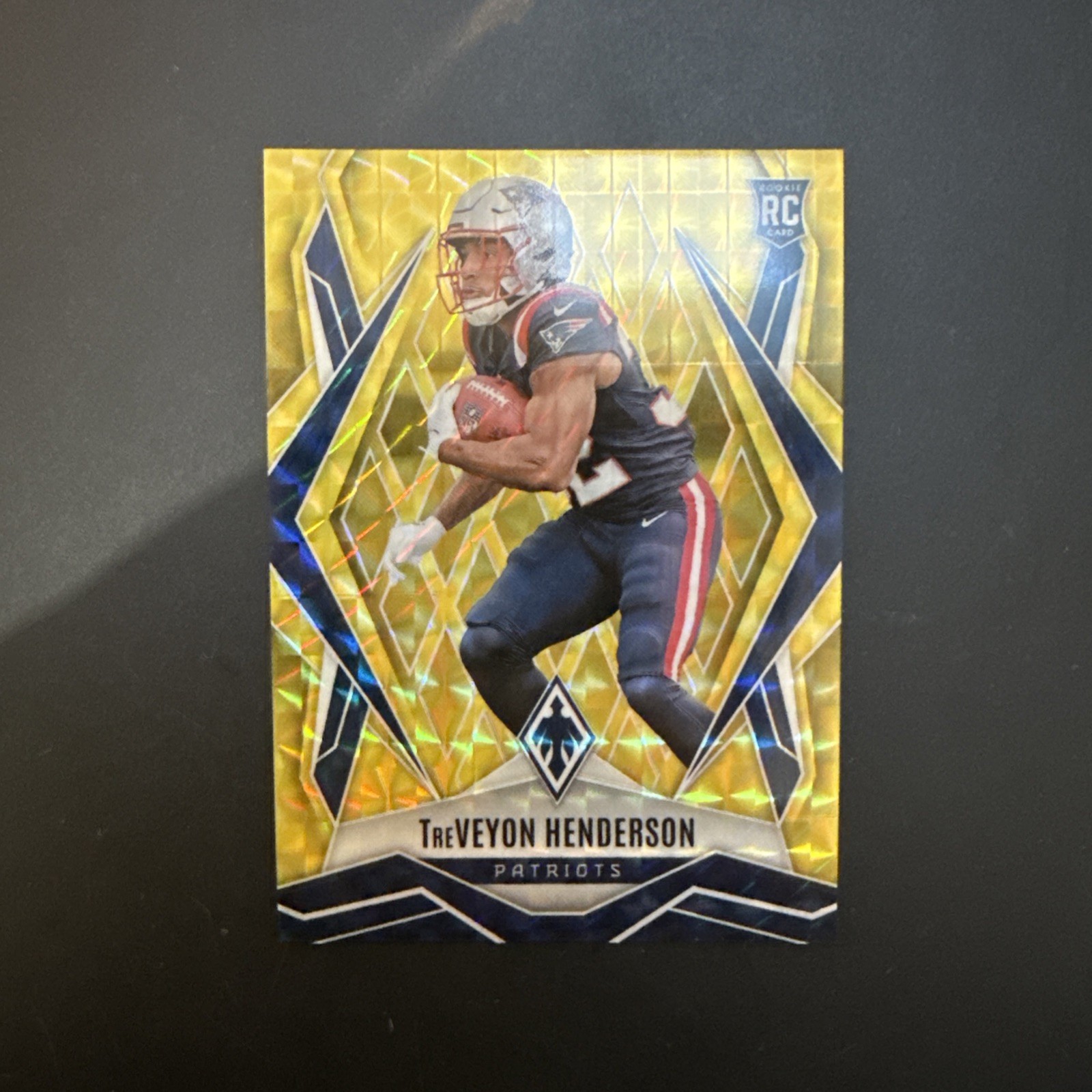 2025 Panini Phoenix - Rookies TreVeyon Henderson #187 Yellow Pyramids /185 (RC)