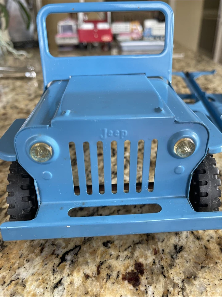 Parabrisas plegable de vehículo Jeep Tonka azul acero años 60 de colección con remolque para barco Foto 2 de 4