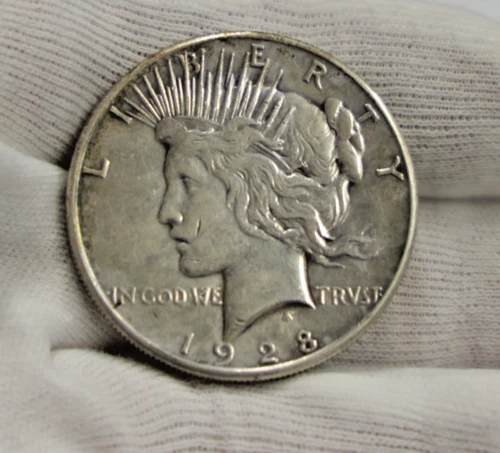 1928 S US Peace Silver Dollar $1 AU (Cleaned)