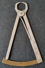 Misuratore decimi a molla per orafo da vecchia officina 1920 circa