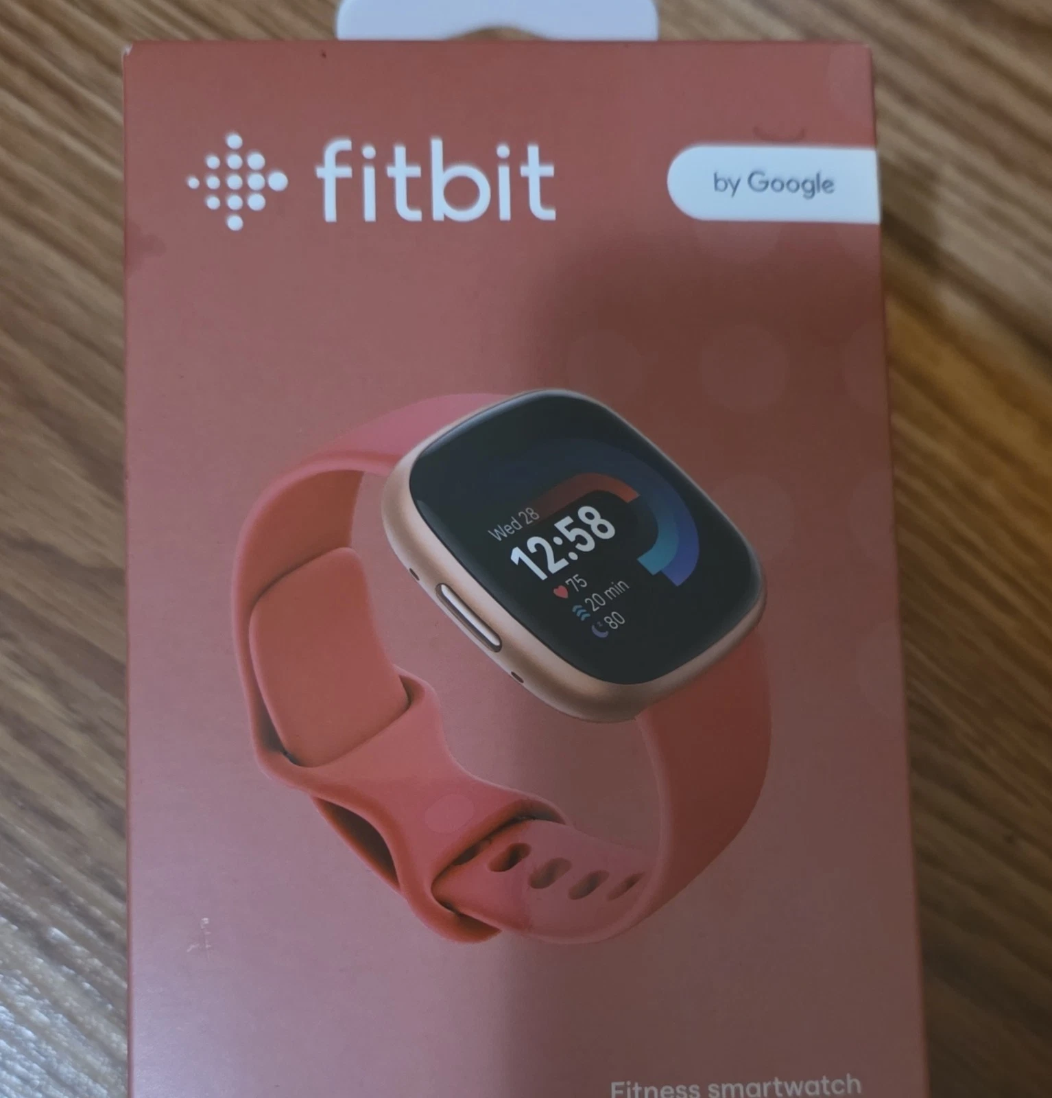 Fitbit Versa 4 Fitness Smartwatch Gold Case Pink Band iOS Android