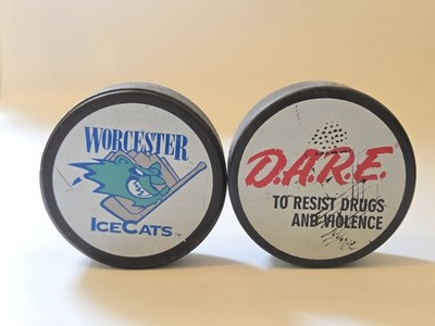 VTG Worcester Ice Cats D.A.R.E. Mike Prokopec #23 Hockey (2) Pucks AHL Defunct 