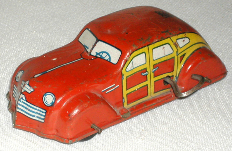 VINTAGE J. CHEIN WINDUP WOODY TIN CAR
