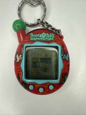 Tamagotchi Connection V4 Red Origami Shell. WORKING With Lanyard